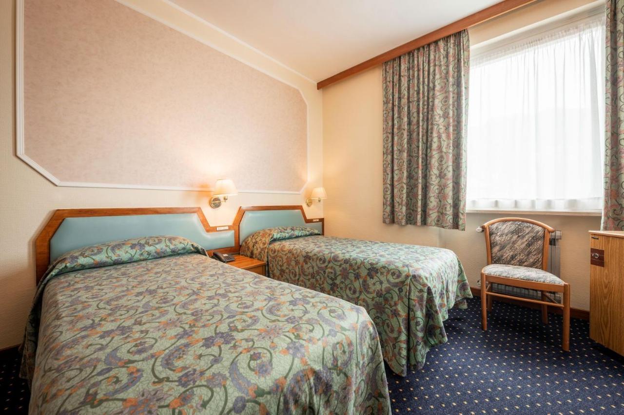 Hotel Elena Saint-Vincent Pokoj fotografie